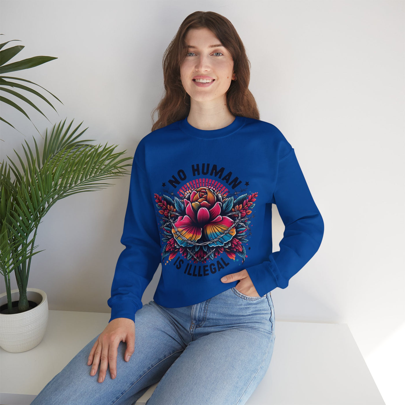 Wear Your Solidarity: No Human is Illegal Sweatshirt