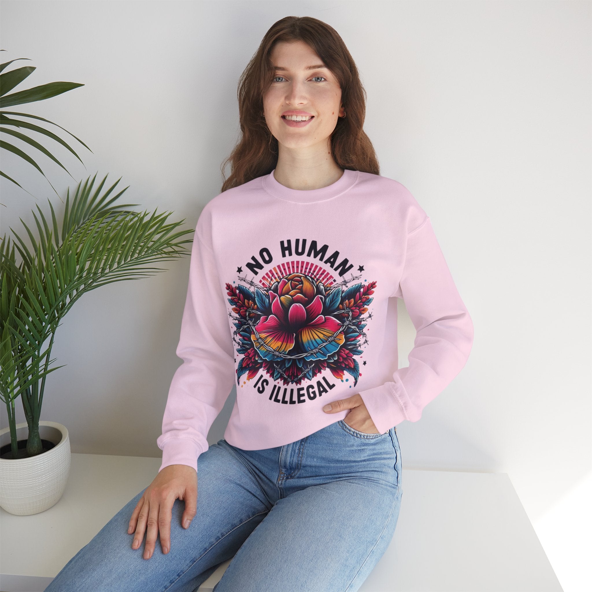 Empowerment Statement: 'No Human Is Illegal' Sweatshirt"